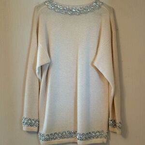 Elegant Cream Sweater with Silver Accents